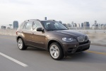 2013 BMW X5 xDrive50i in Sparkling Bronze Metallic - Driving Front Right Three-quarter View